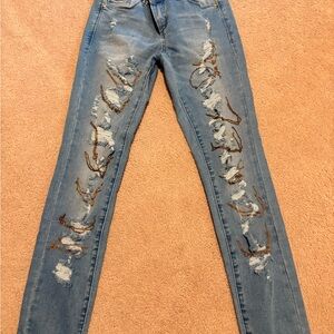 bebe Blue Distressed Skinny Jeans